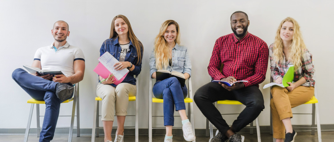 cheerful-students-posing-RECOUPEE